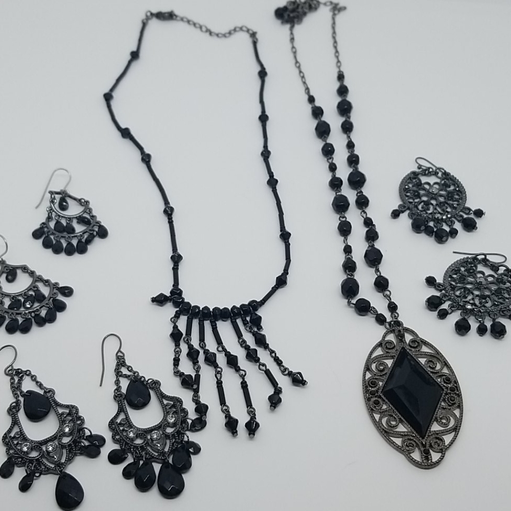 2 necklaces and 3 pairs of earrings